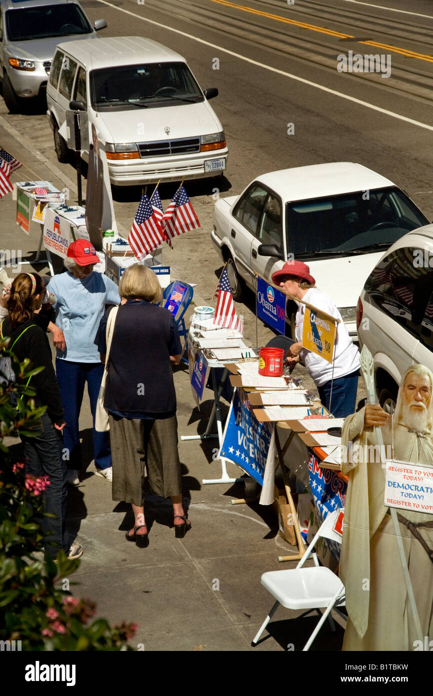 Elderly members of a local church group staff a sidewalk voter registration drive in San Francisco Note cutout figure Stock Photo
