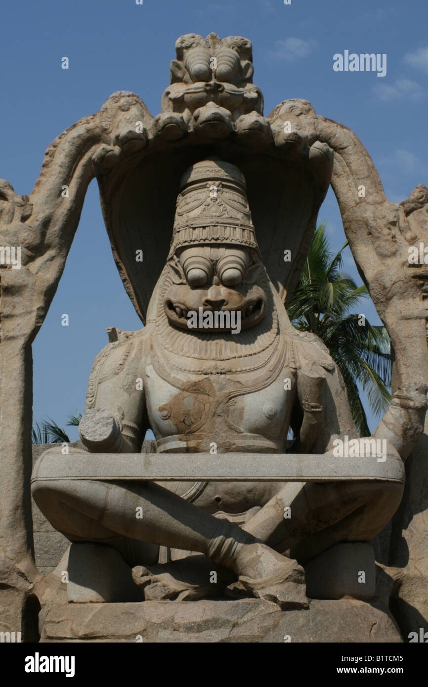 22 feet or 6 . 7 metre tall colossus of Ugra Narasimha , Hampi , Karnataka , India Stock Photo