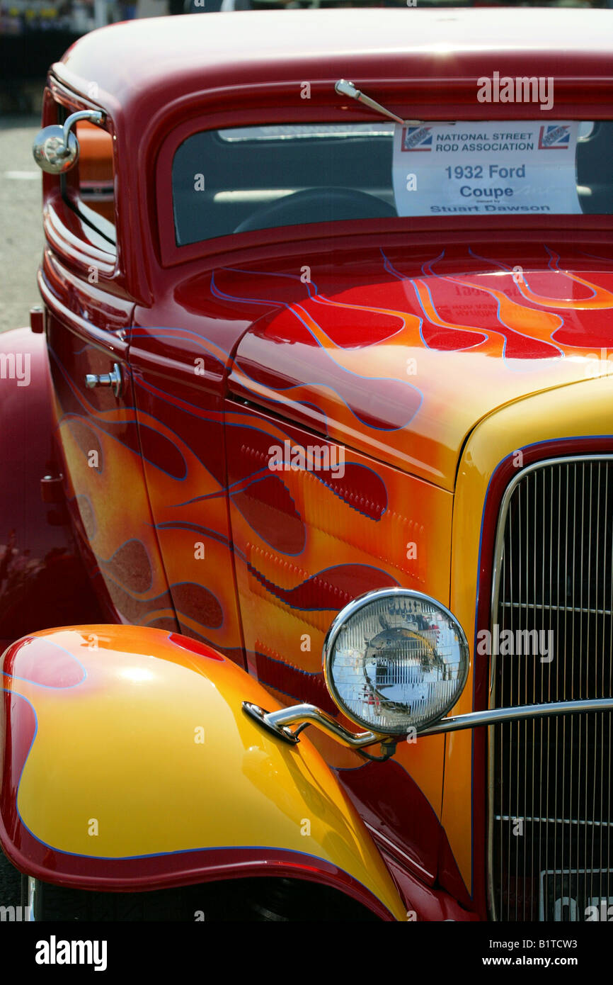 1934, ford,hot rod, custom car, 34 coupe, modified car, red, flames, chrome, peep mirror, lush, paint, paint job, gleaming Stock Photo