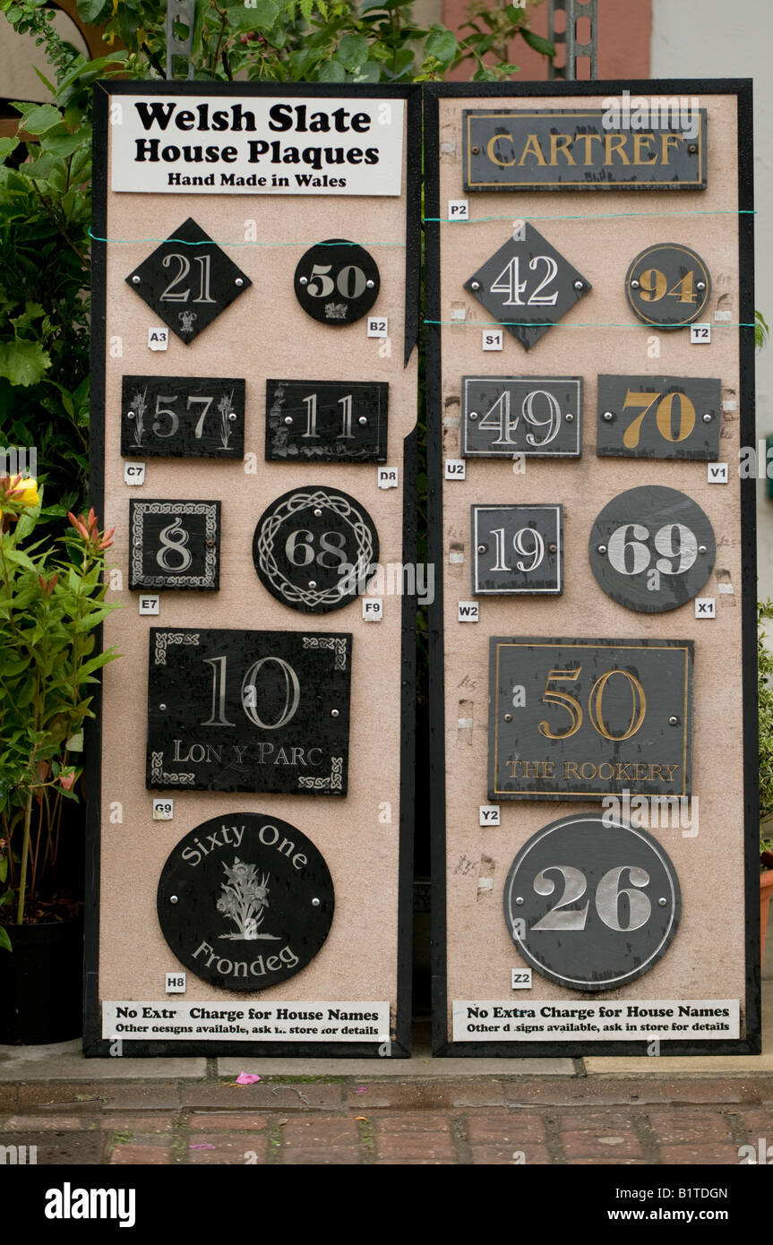 carved welsh slate house name and number plaques for sale Stock Photo