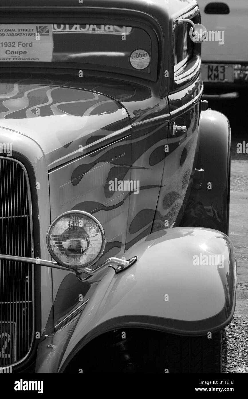 1934, ford,hot rod, custom car, 34 coupe, modified car, flames, chrome, peep mirror, lush, paint, paint job, gleaming, b+w Stock Photo