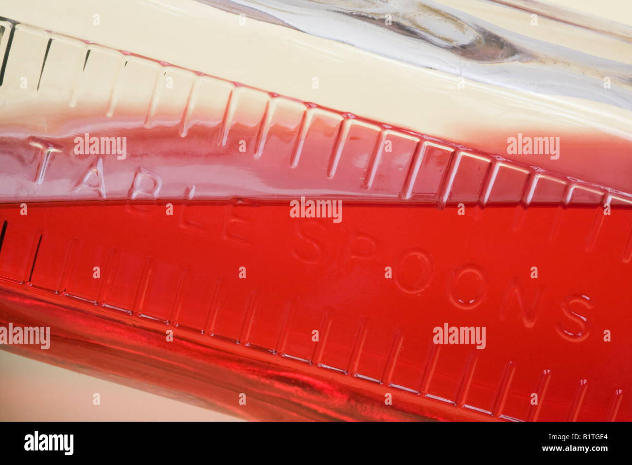 Studio Still life Old glass bottle with graduations for for measuring
