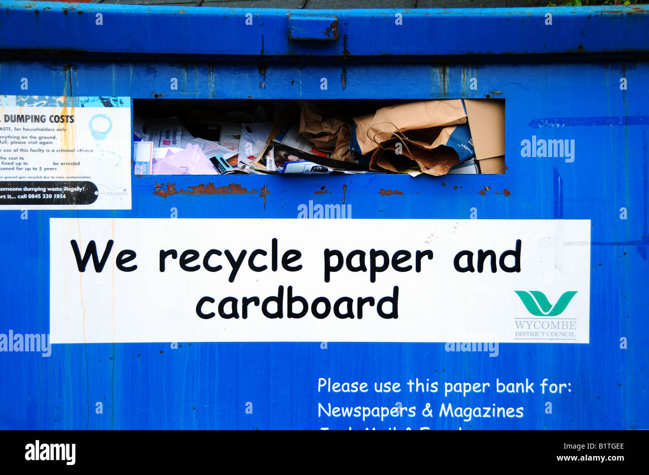 Paper and cardboard recycling bank, UK Stock Photo