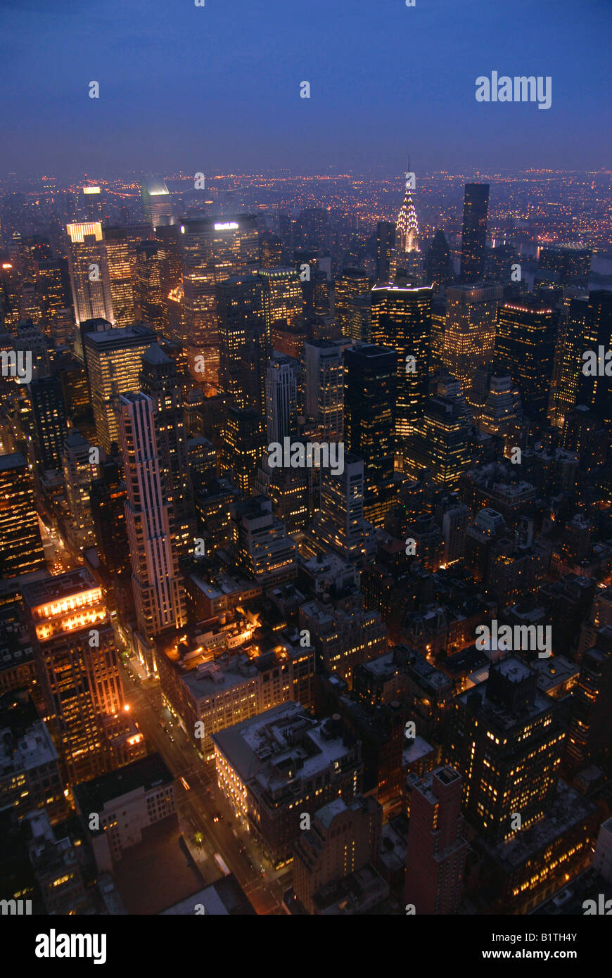 New York City skyline viewed at night from the Empire State Building ...