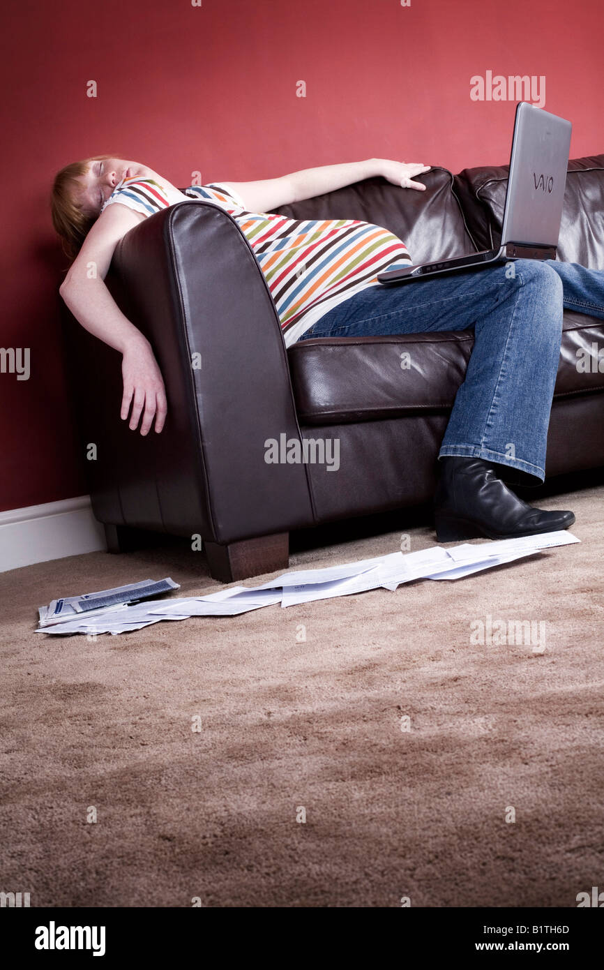 Pregnant Woman falling asleep whilst using a Laptop Stock Photo Alamy