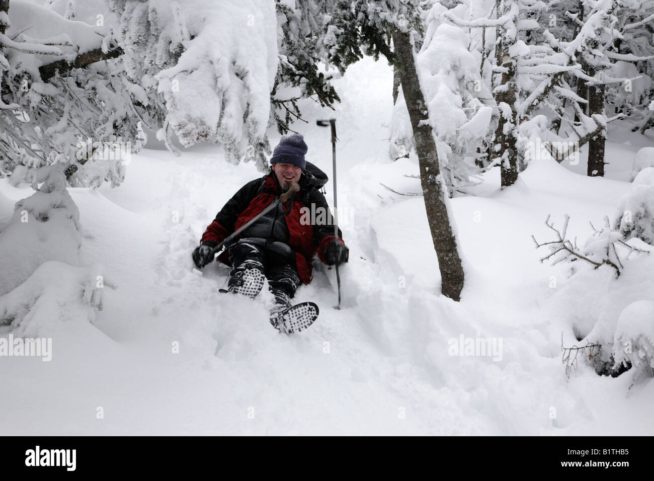 A hiker enjoys the Avalon Trail in the White Mountains New Hampshire USA during the winter months Stock Photo