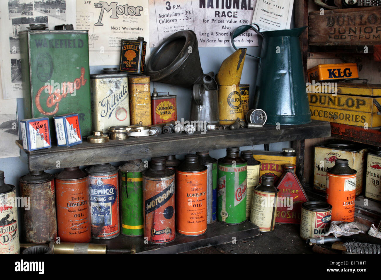 A shelf full of motor oil, lubricants and spares. Stock Photo