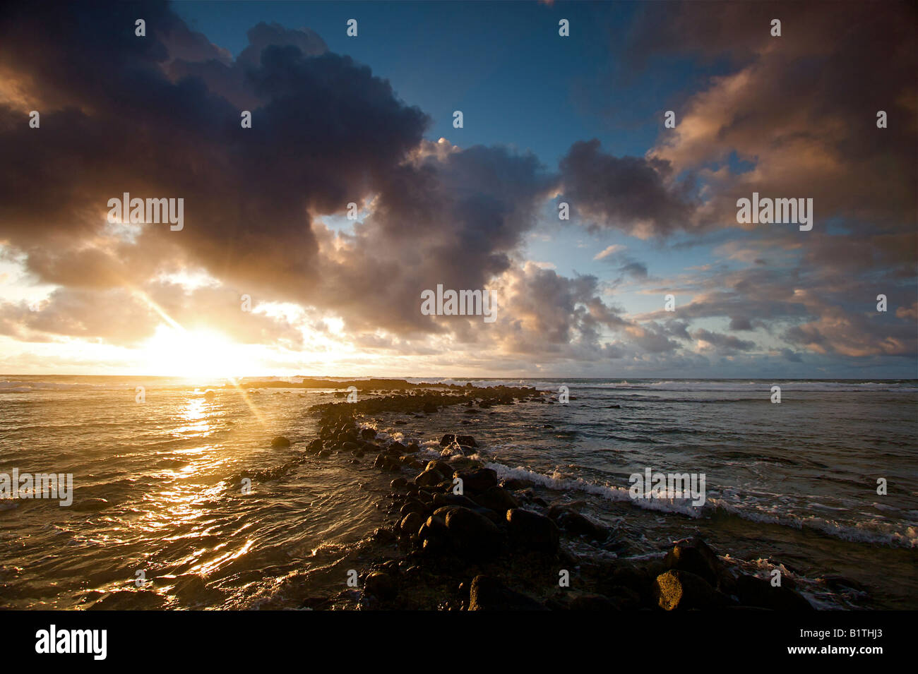 Colorful morning sunrise over the Hawaiian island of Kauai Stock Photo ...