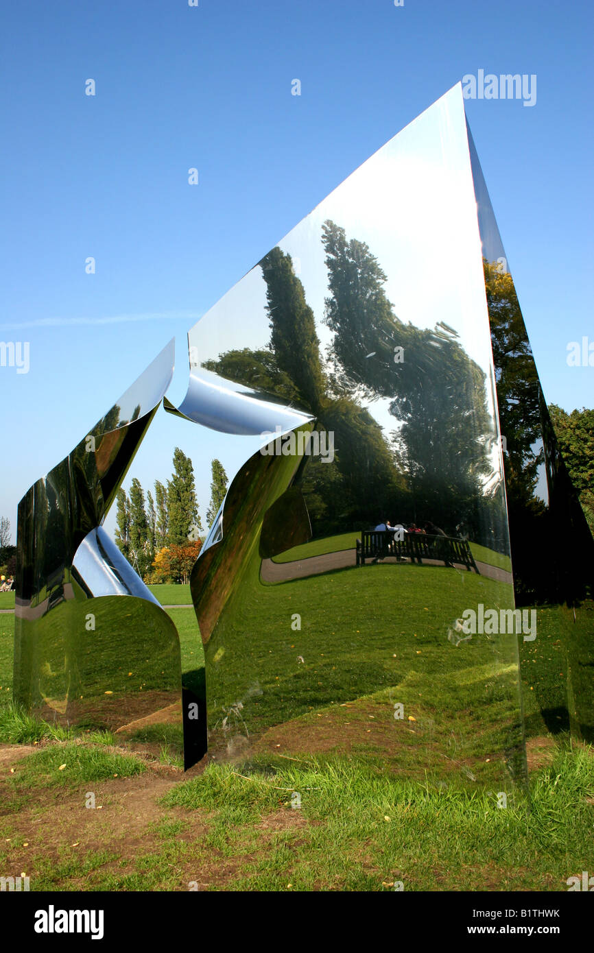 Reflections in metal pyramid Stock Photo