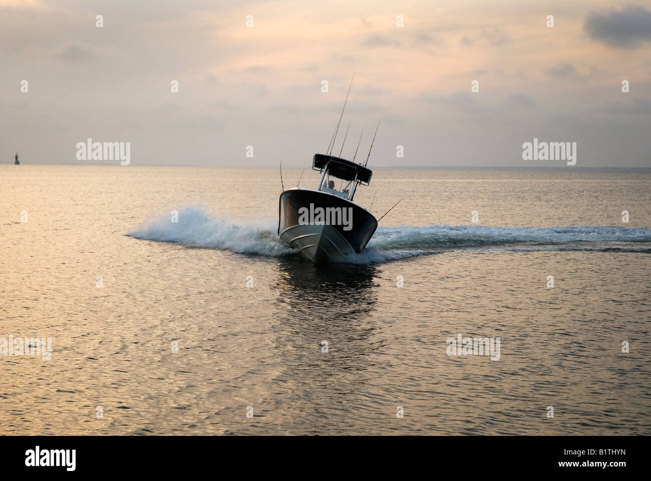 high powered fishing boat cruises Apalachicola Bay along North Florida