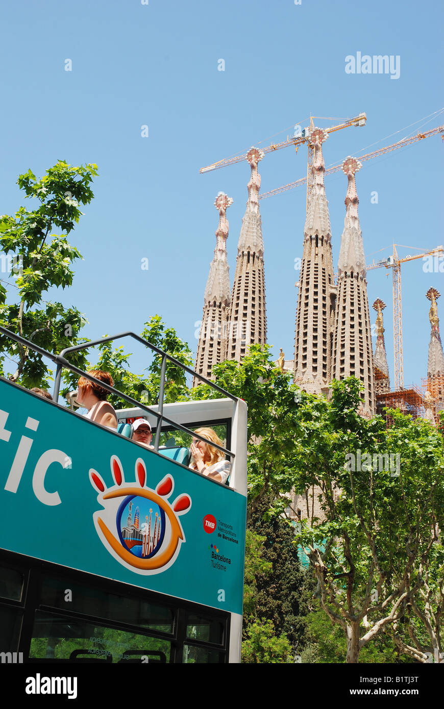 Detail of tourist bus and Sagrada Familia temple. Barcelona. Catalonia. Spain. Stock Photo