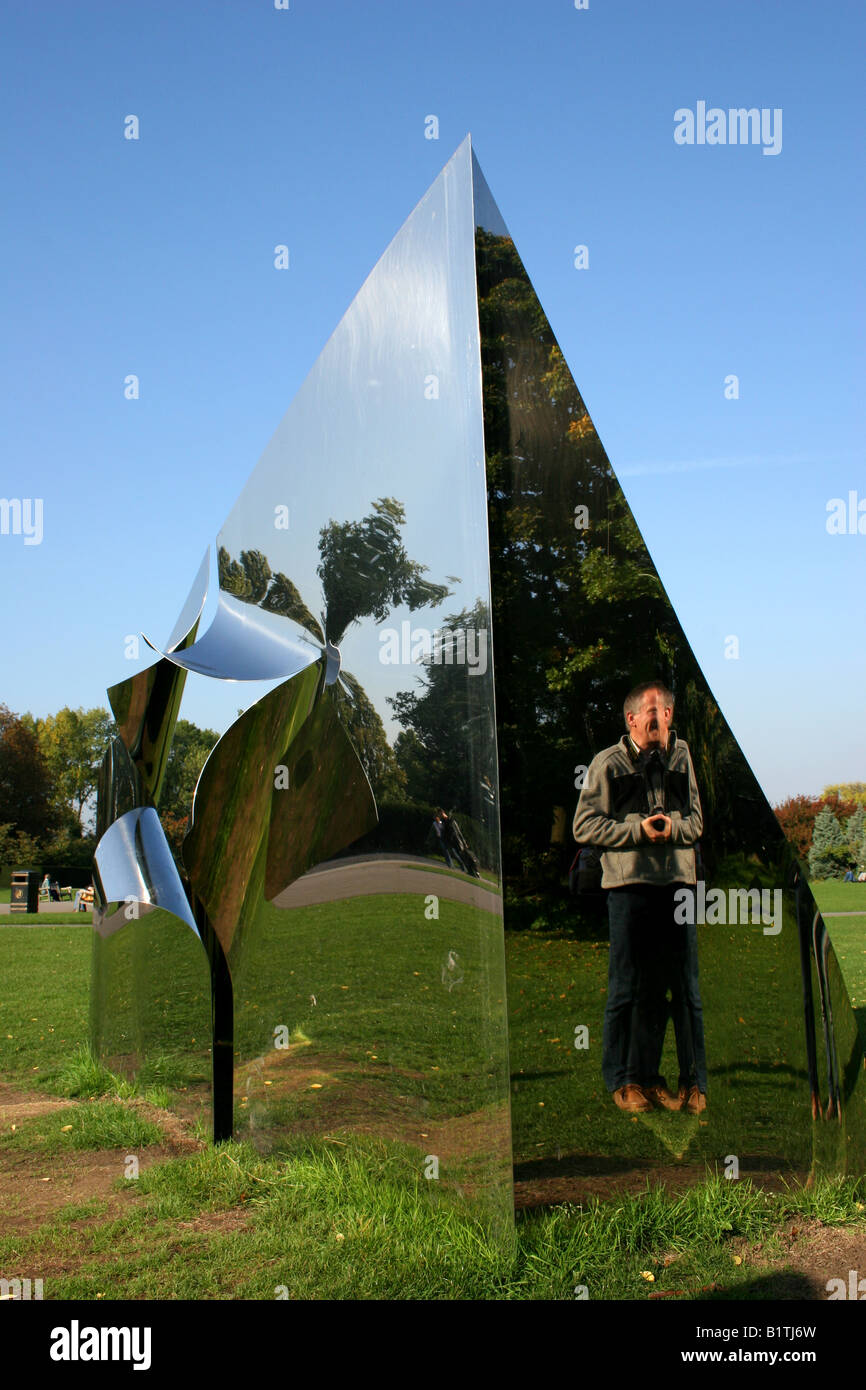 Reflections in metal pyramid Stock Photo