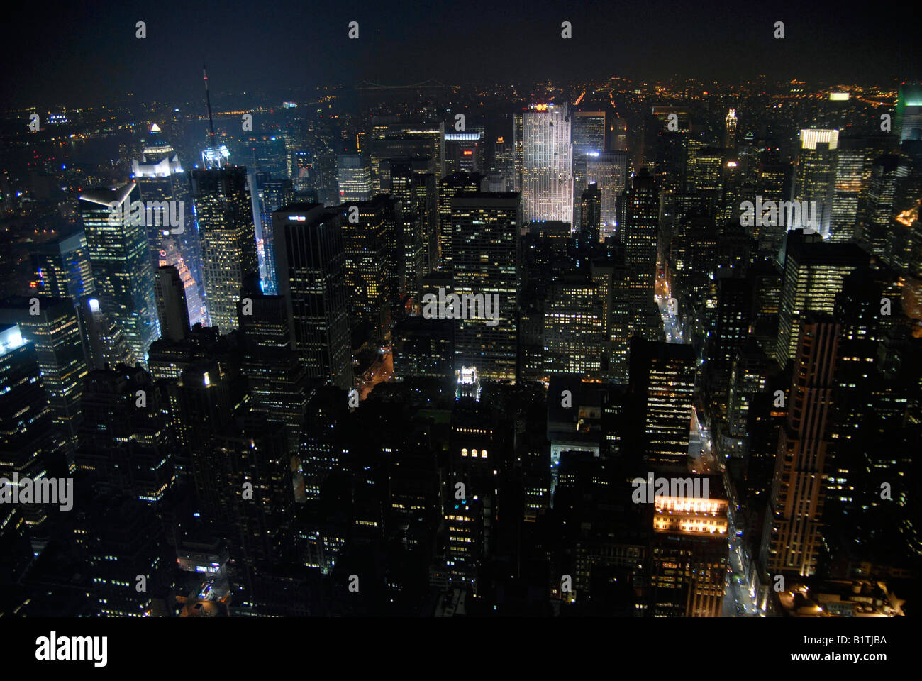 New York City skyline viewed at night from the Empire State Building ...