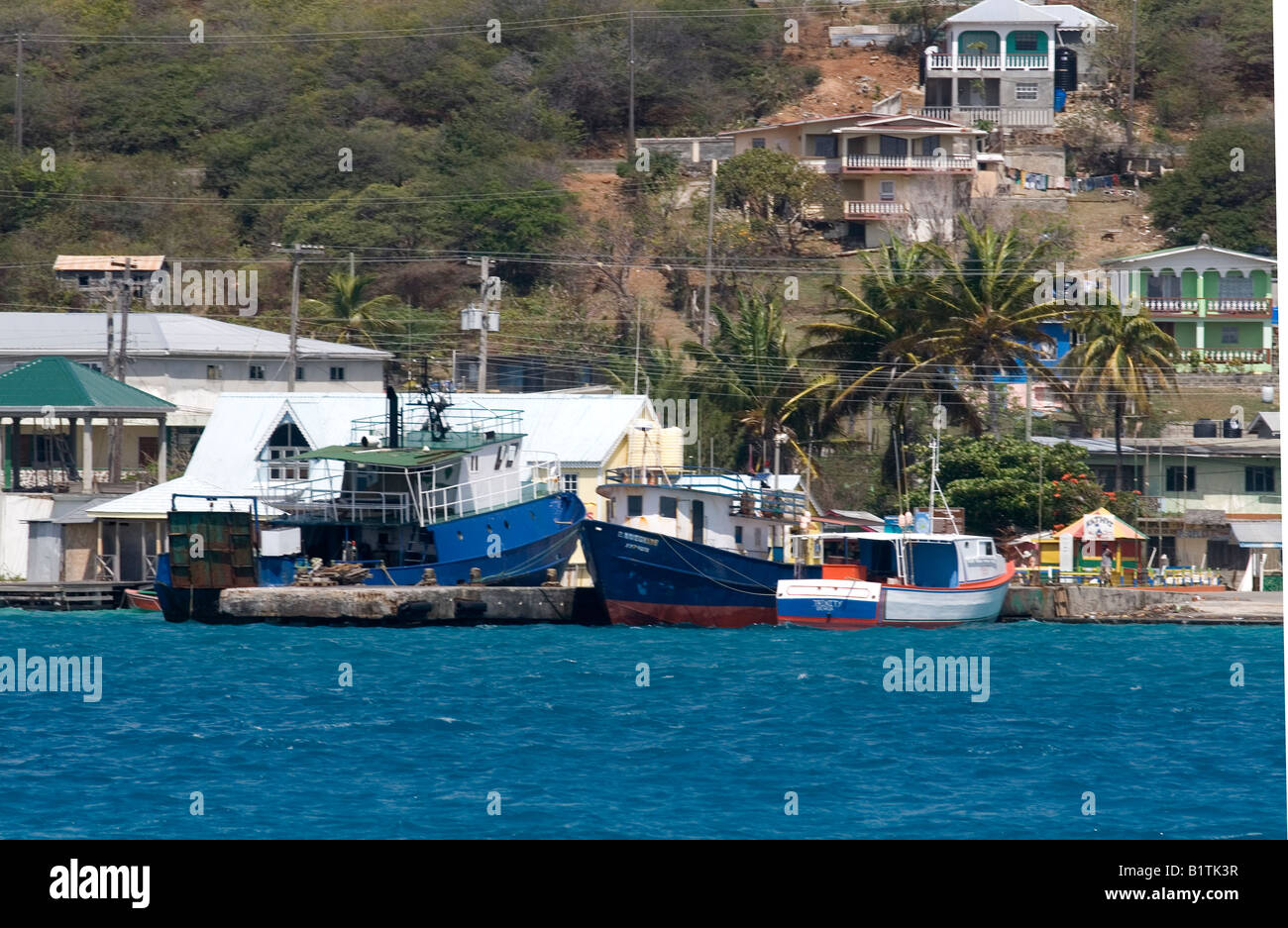 Fishing boats moored in Clifton harbour, Union island, Eastern Caribbean Stock Photo