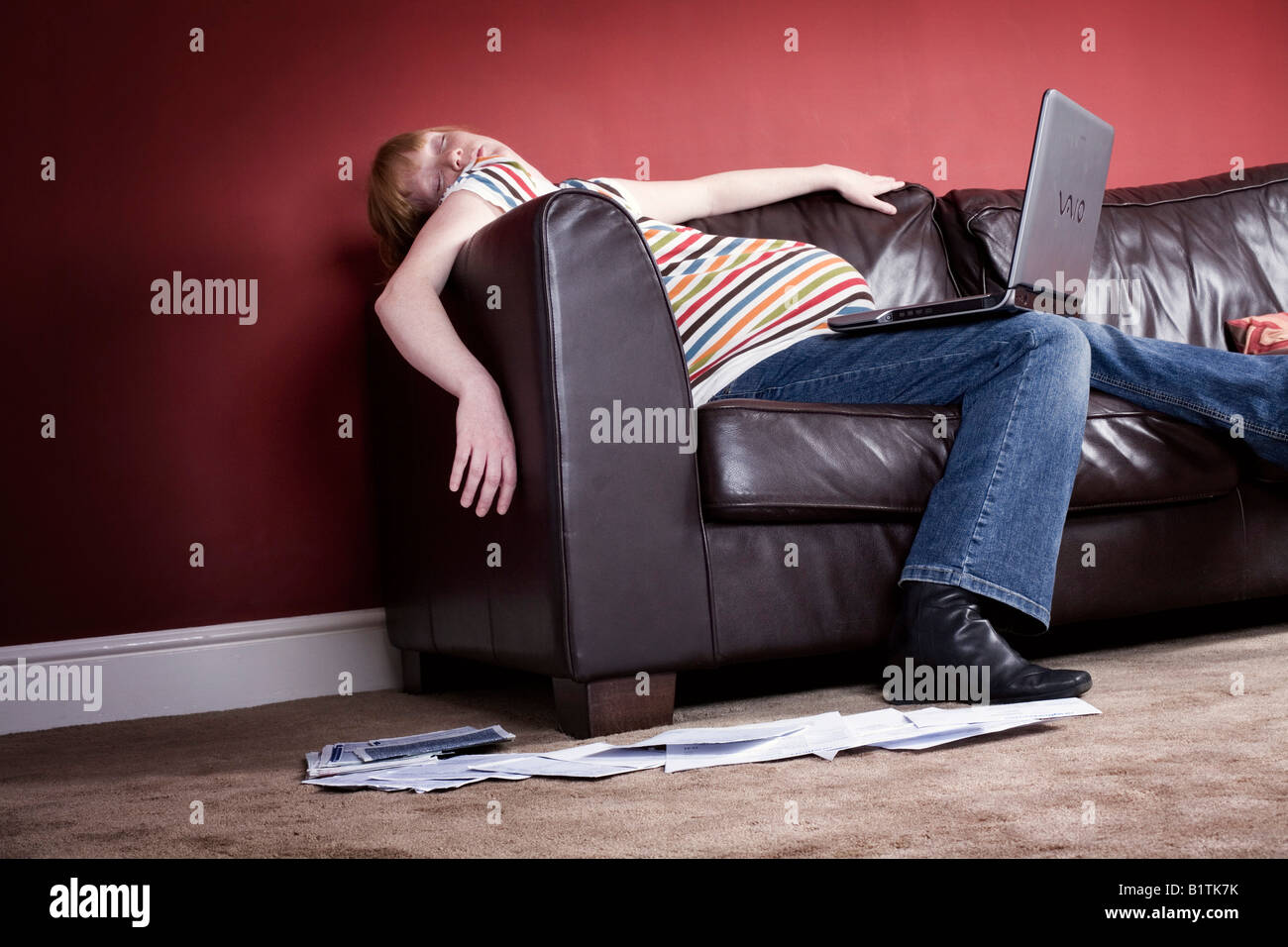 Pregnant Woman falling asleep whilst using a Laptop Stock Photo Alamy