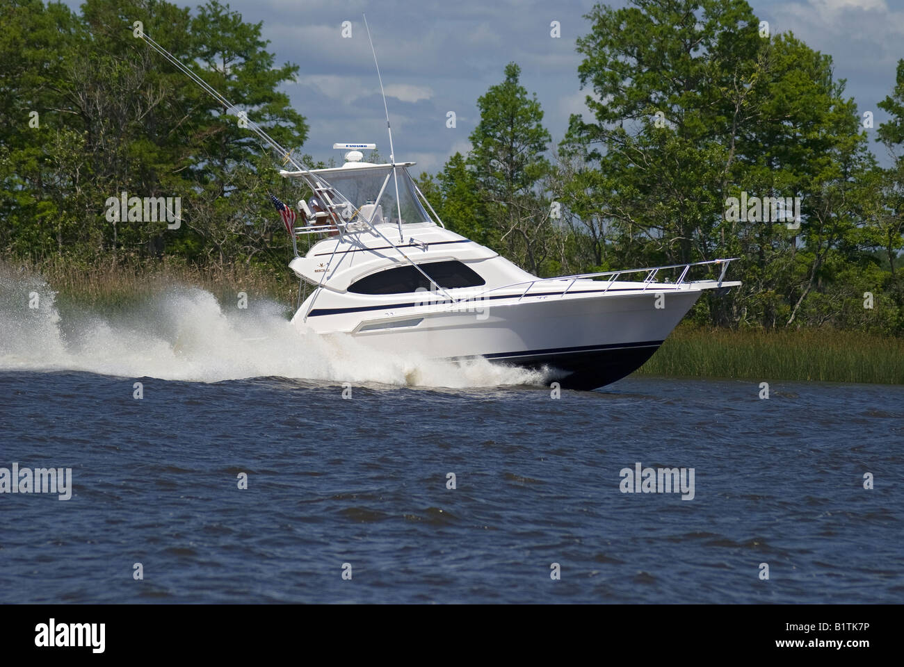 power boat travels the lower Apalachicola River near Apalachicola