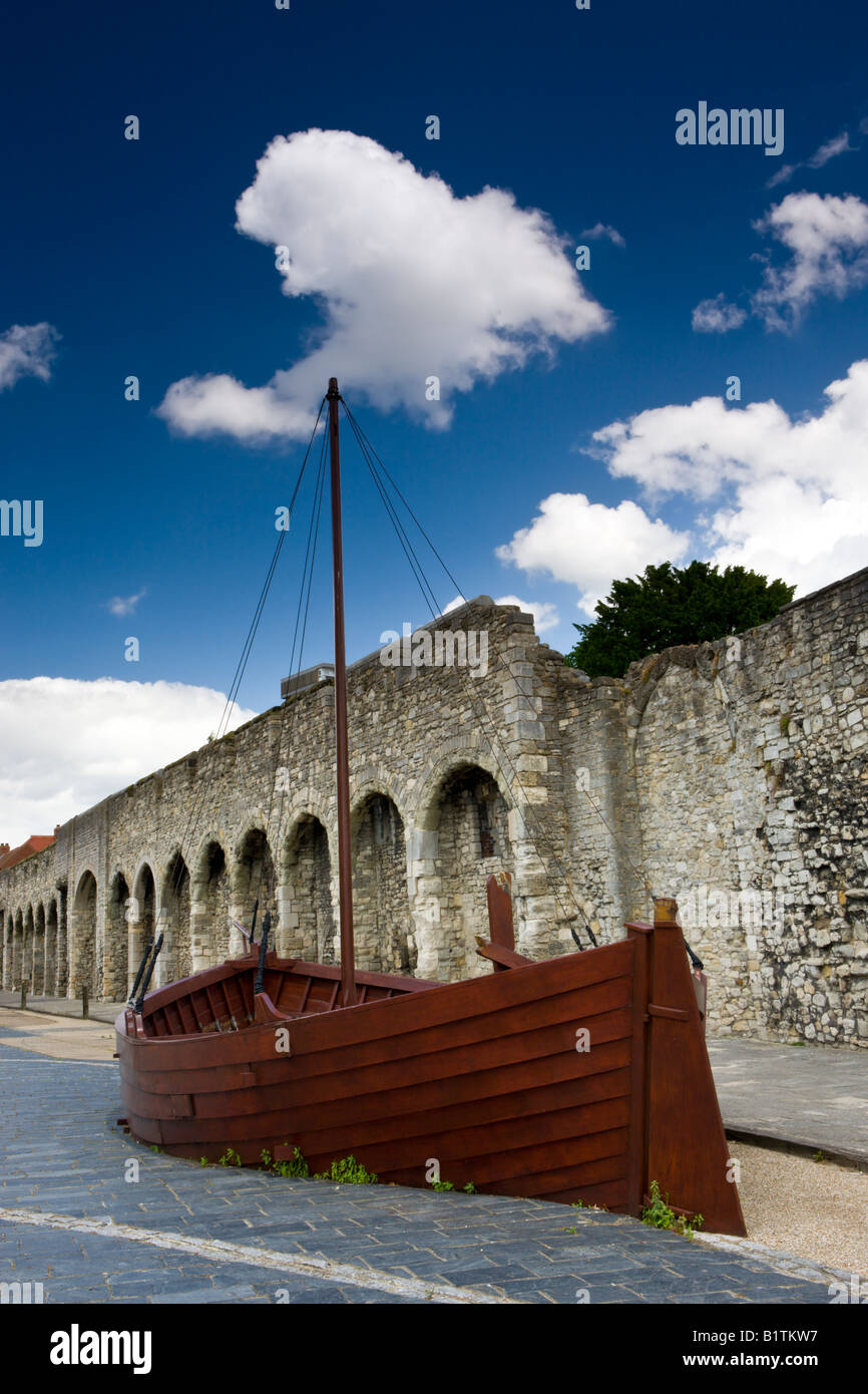 Replica of a medieval merchant boat alongside Southampton walls Hampshire England Stock Photo