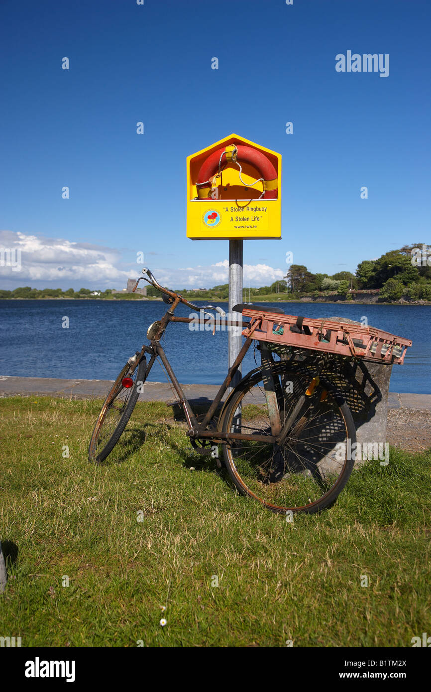 Bicycle and LIfebuoy at Kinvara Harbour, County Galway, Ireland Stock