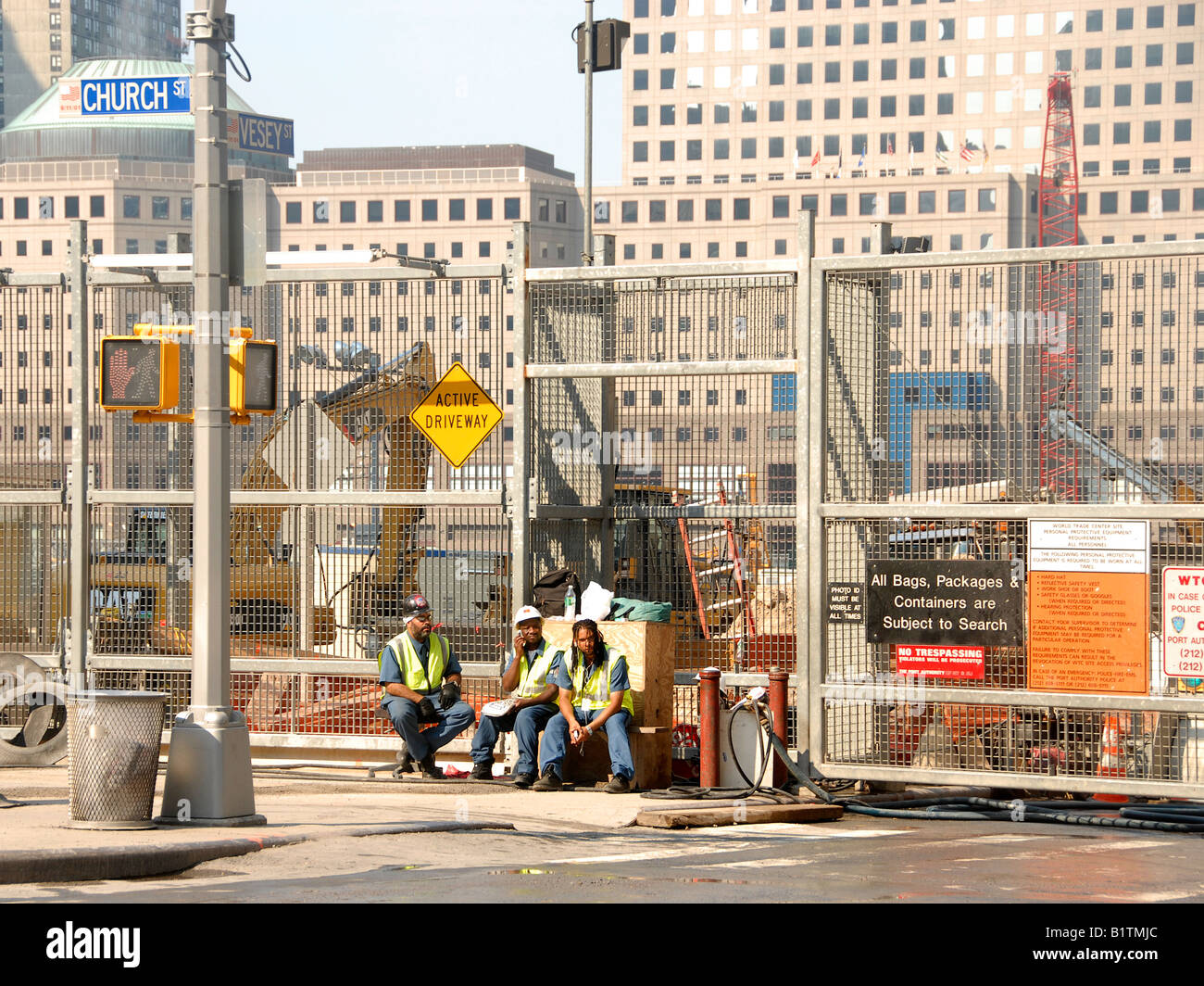 Three workers, taking a break in Churchstreet, New York Stock Photo