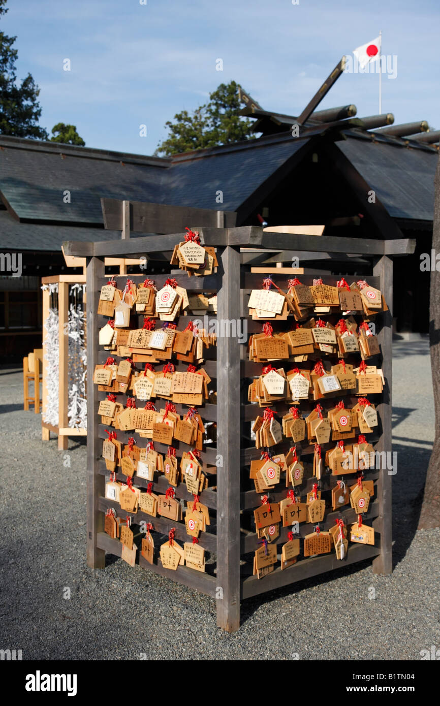 The pentagon-shaped, wooden wishing plates called Ema. Shinto shrine in Sapporo, Japan. Stock Photo