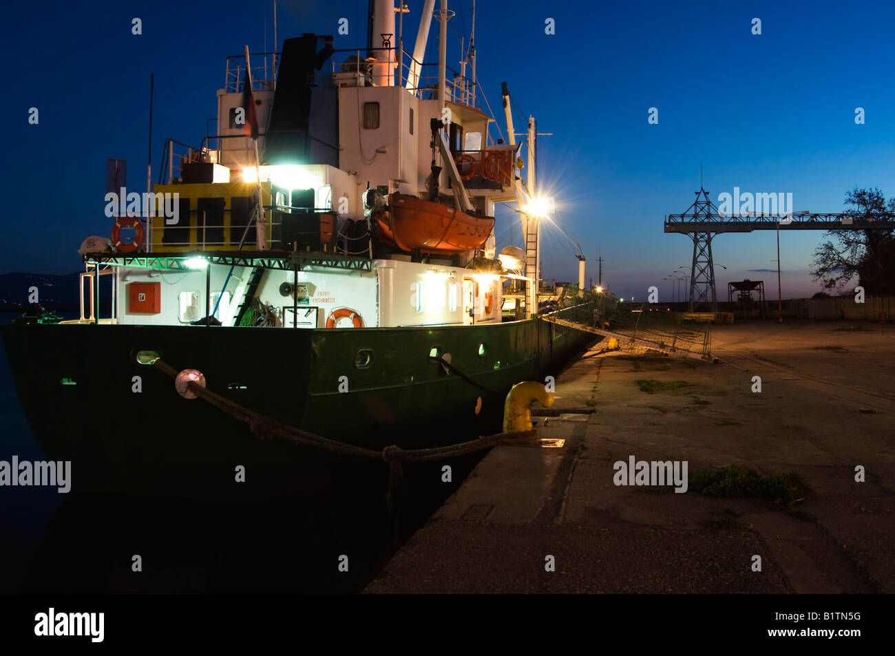 Ship in harbor, at dusk Stock Photo