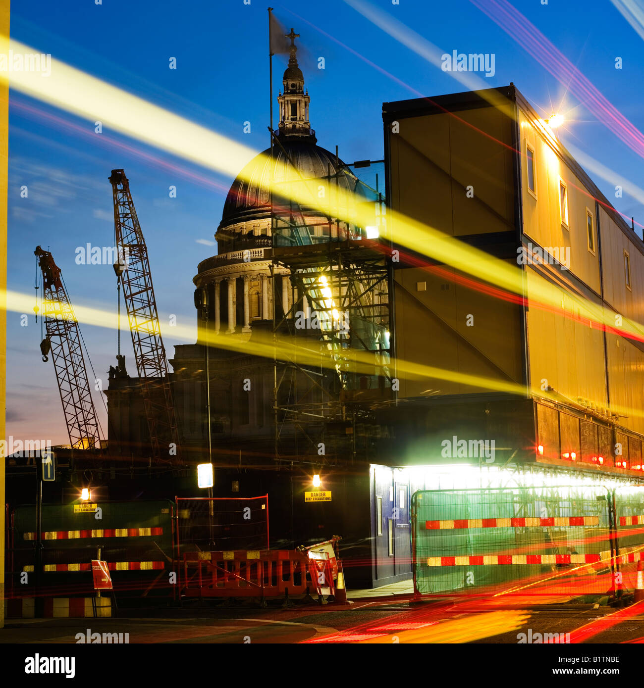 Night time regenerating London St Paul's construction site cabins Stock Photo