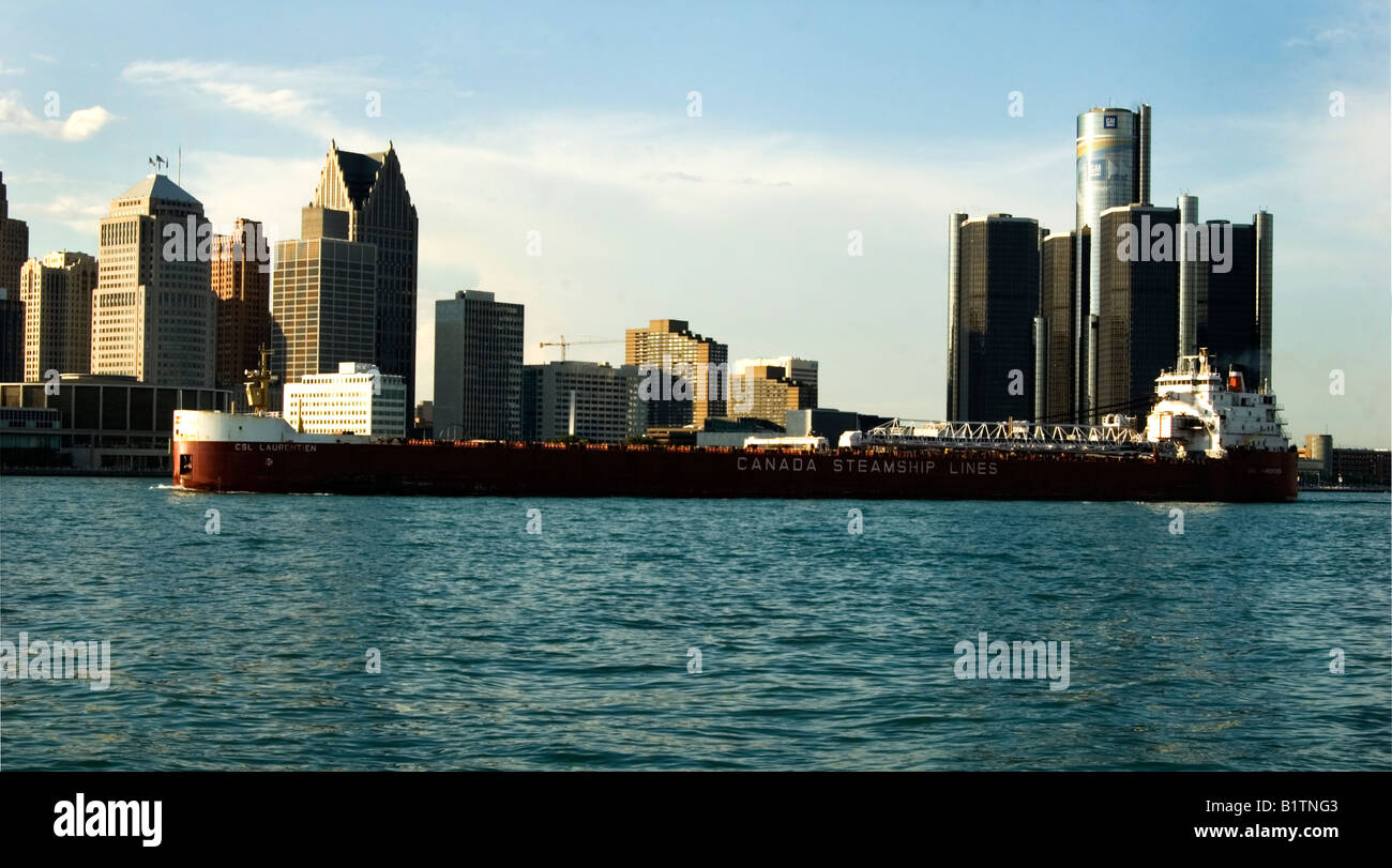 CSL Laurentien a Canadian Streamship Lines Lake Freighter in front of the Detroit Michigan Skyline Stock Photo