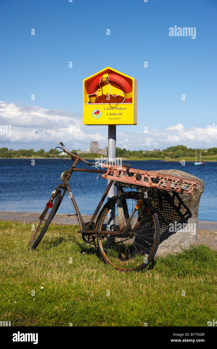Bicycle and LIfebuoy at Kinvara Harbour, County Galway, Ireland Stock