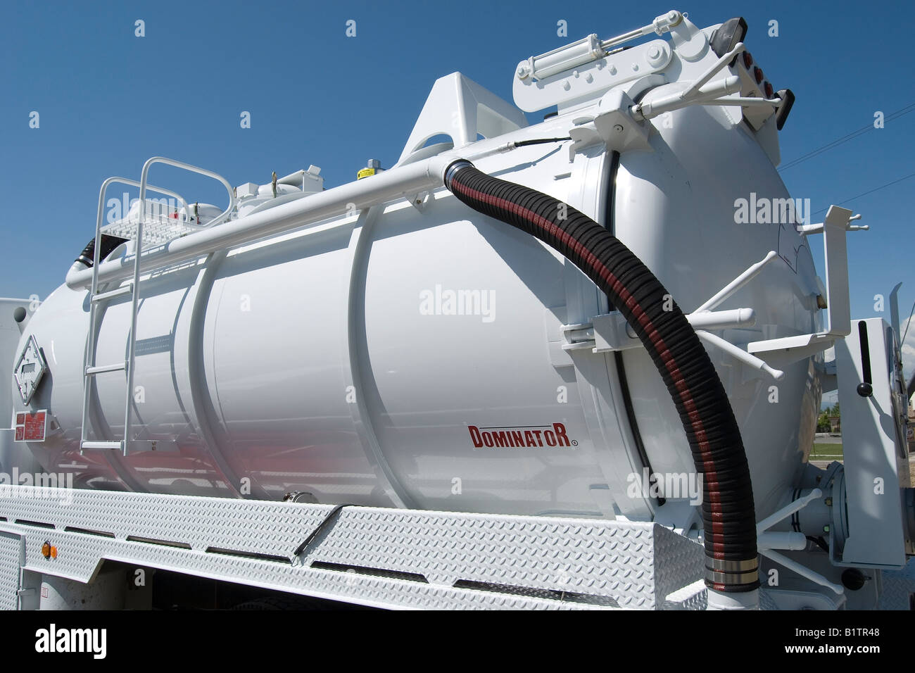 Vacuum tanker truck used to remove and transport hazardous liquids