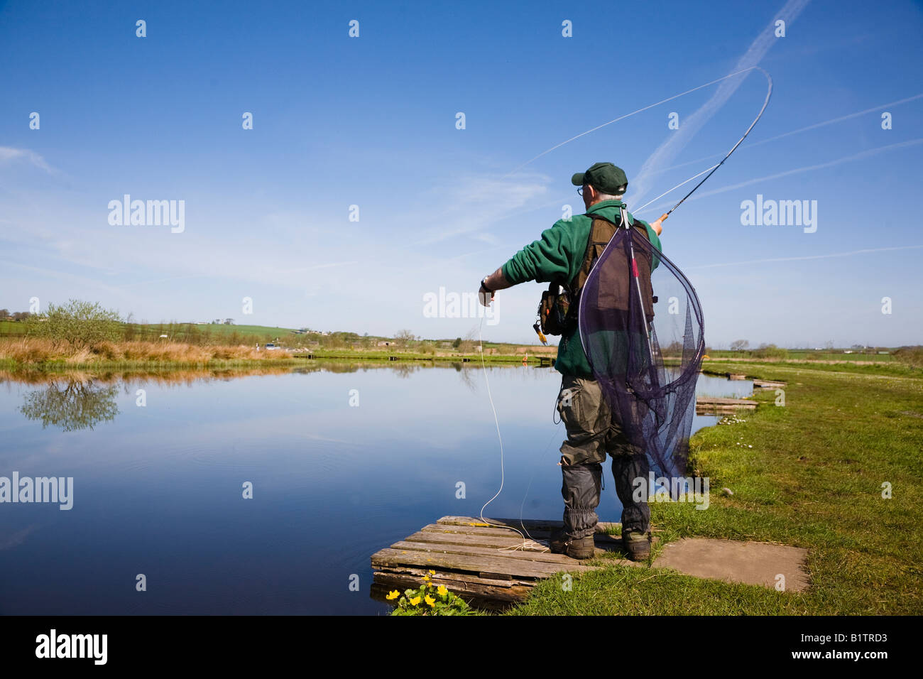 man fishing for trout using rod and line, near Symington, Ayrshire, Scotland, UK Stock Photo Alamy