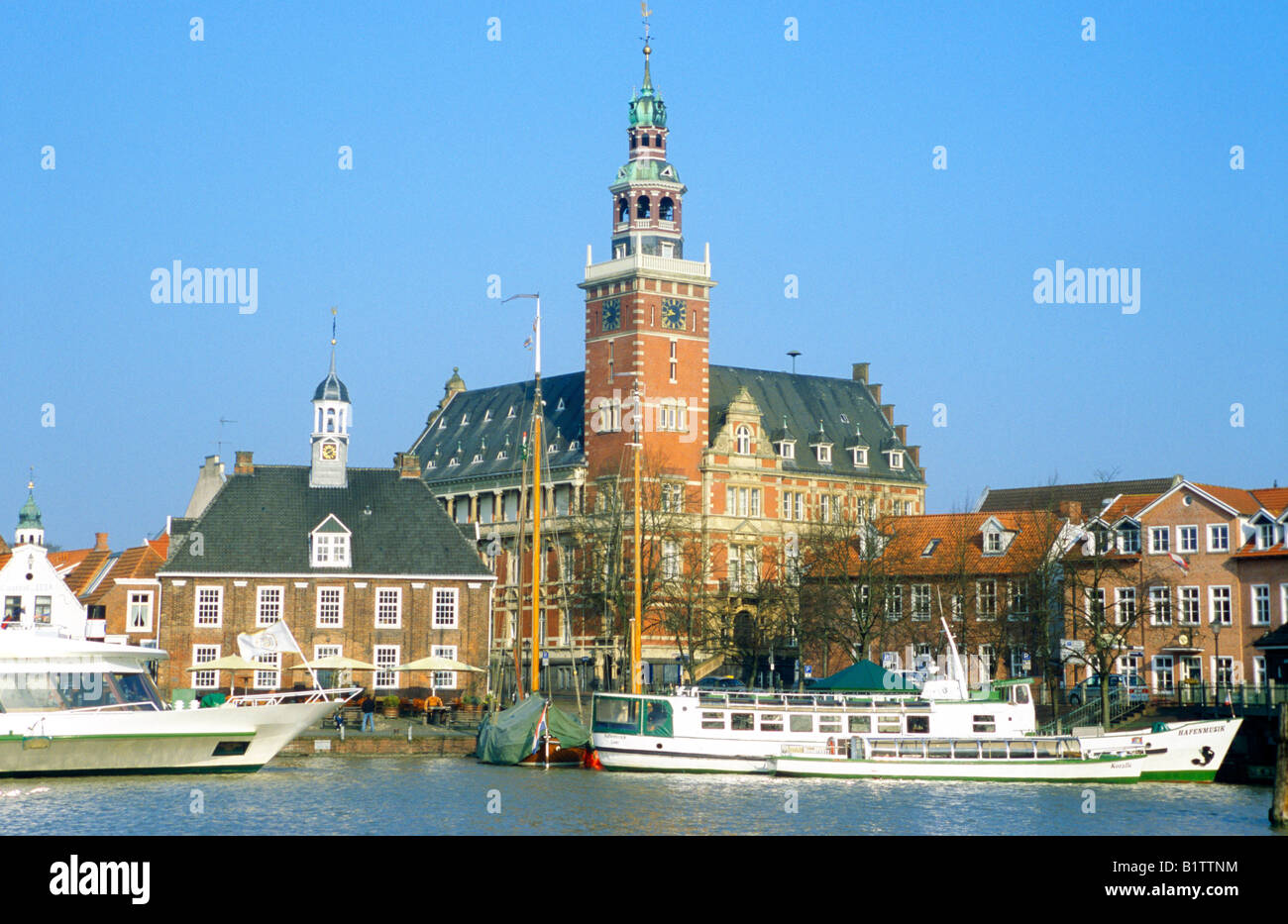 harbour with Waage Building and town hall at Leer in East Friesland in Northern Germany Stock Photo
