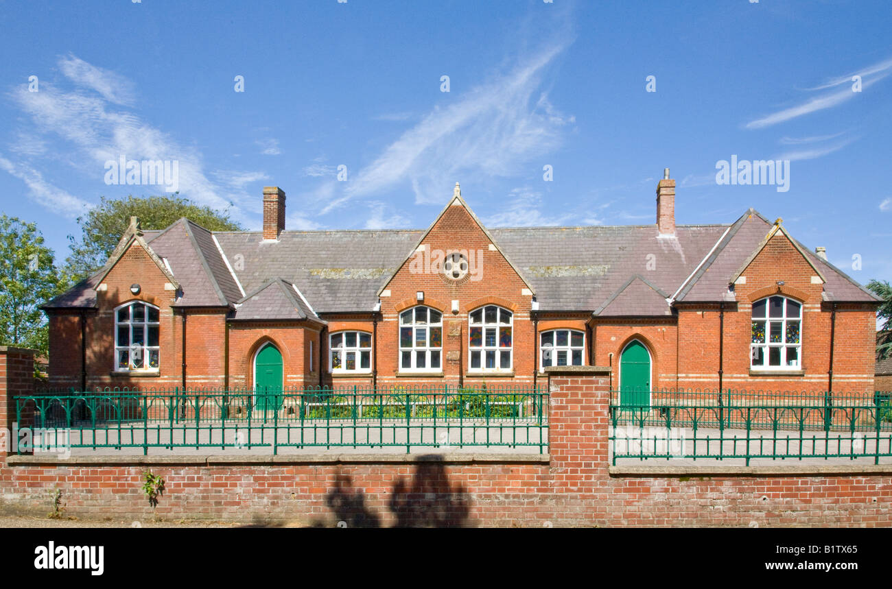 Brick built Victorian village school in Old Catton Norwich Norfolk England Stock Photo