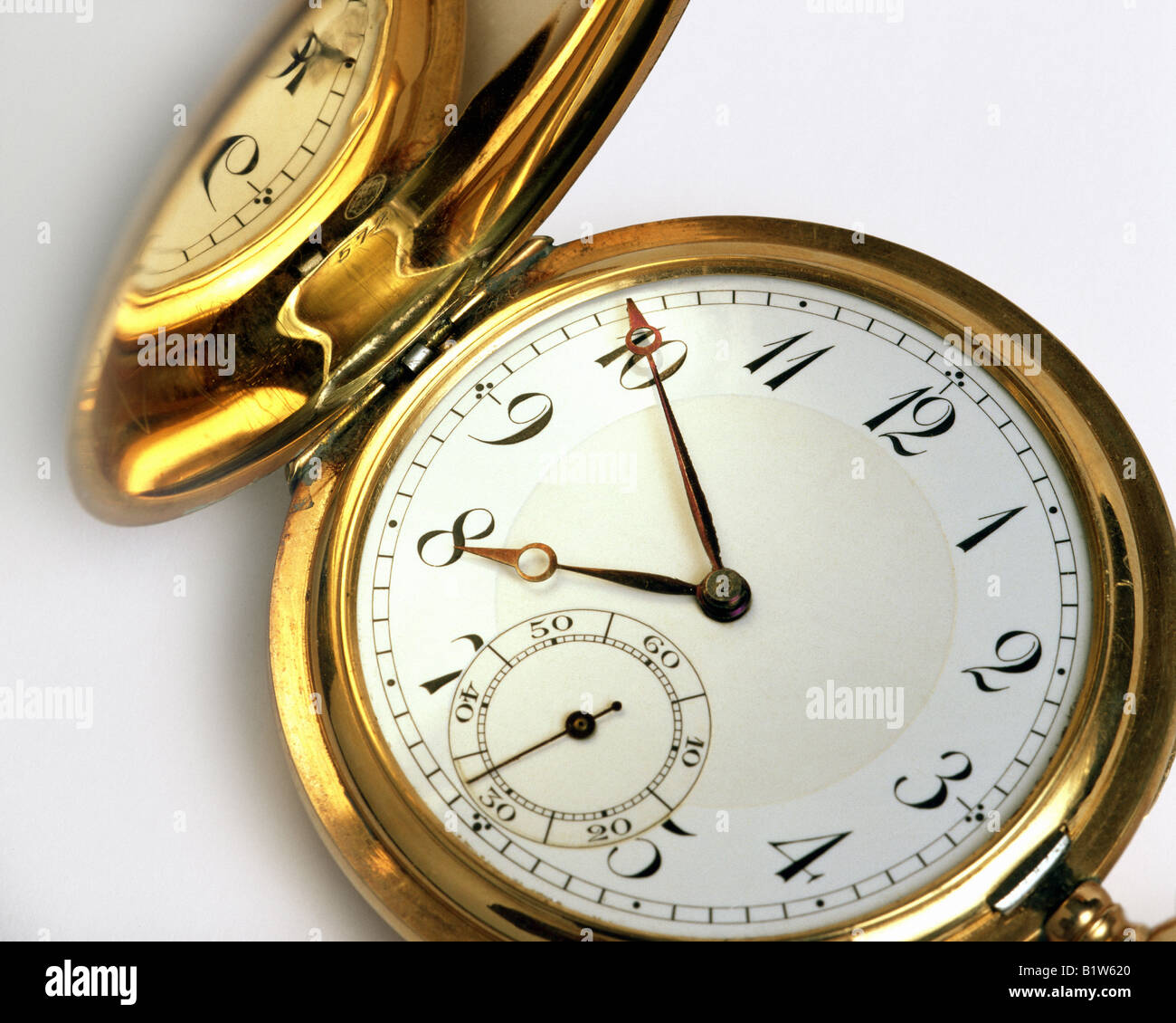 TIME CONCEPT: Golden Pocket Watch Stock Photo