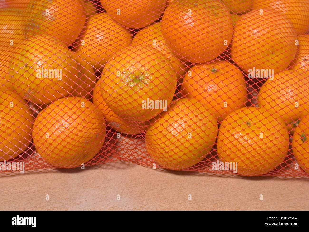 clementine oranges in net bag Stock Photo Alamy