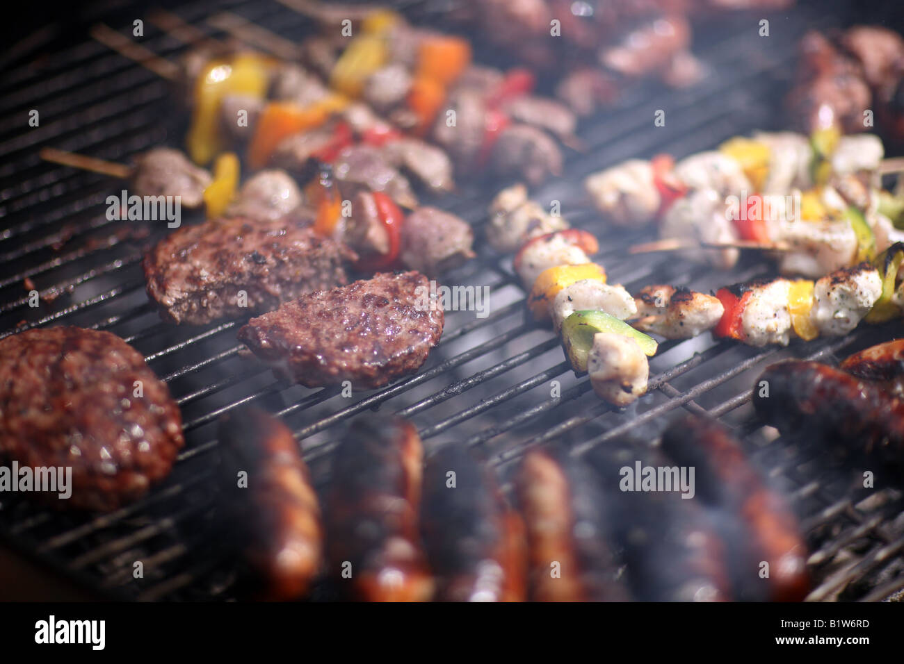 Kettle barbeque in use Stock Photo Alamy