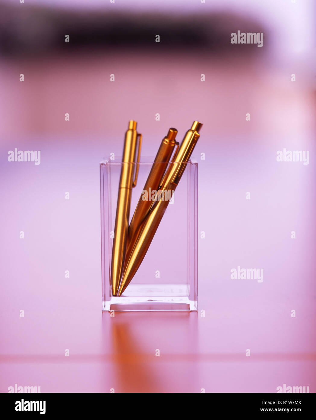 pens in glass tumbler Stock Photo