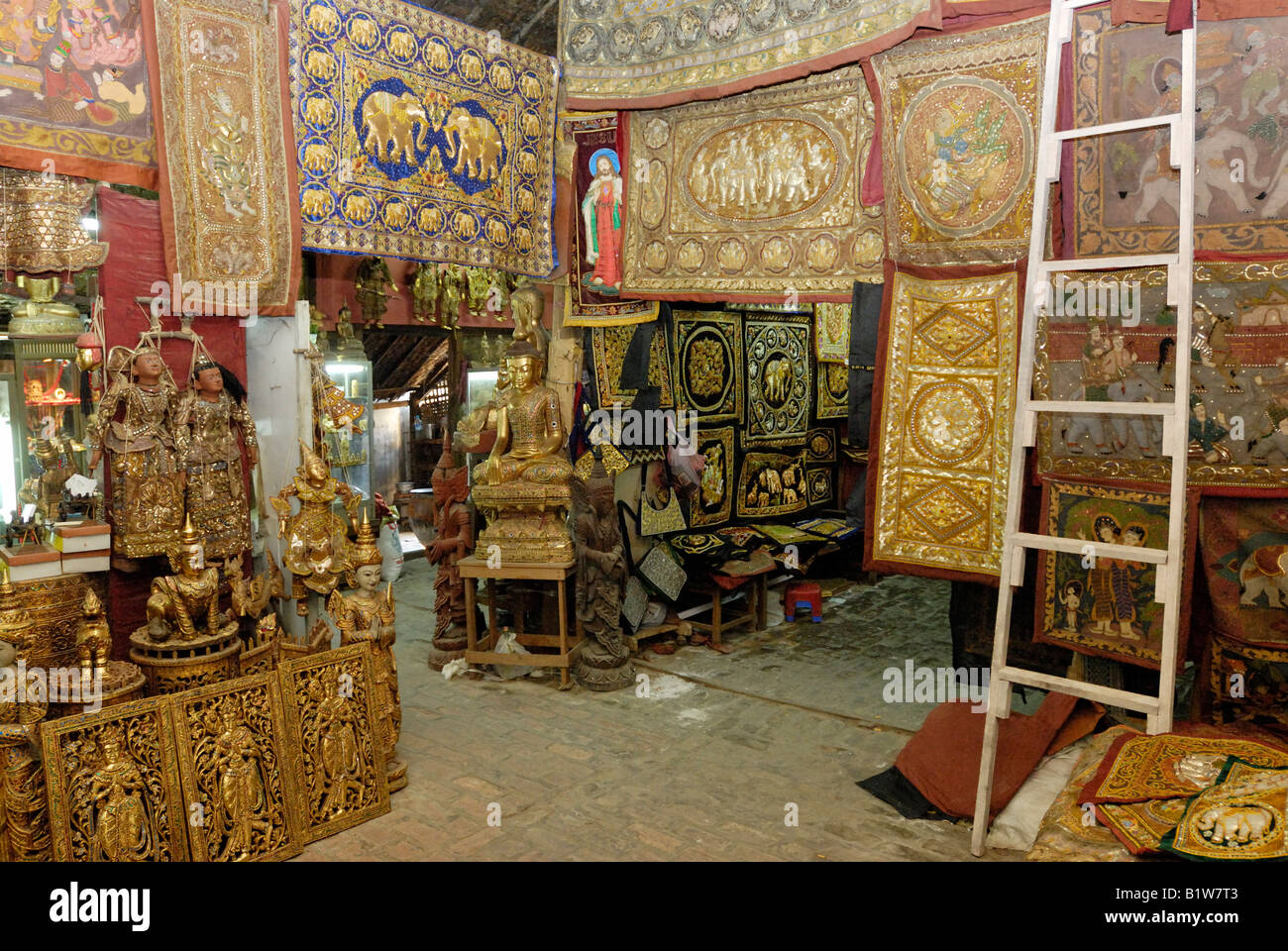 tapestries in a workshop of tapestry marionettes and other souvenirs, MANDALAY AMARAPURA, MYANMAR BURMA BIRMA Stock Photo