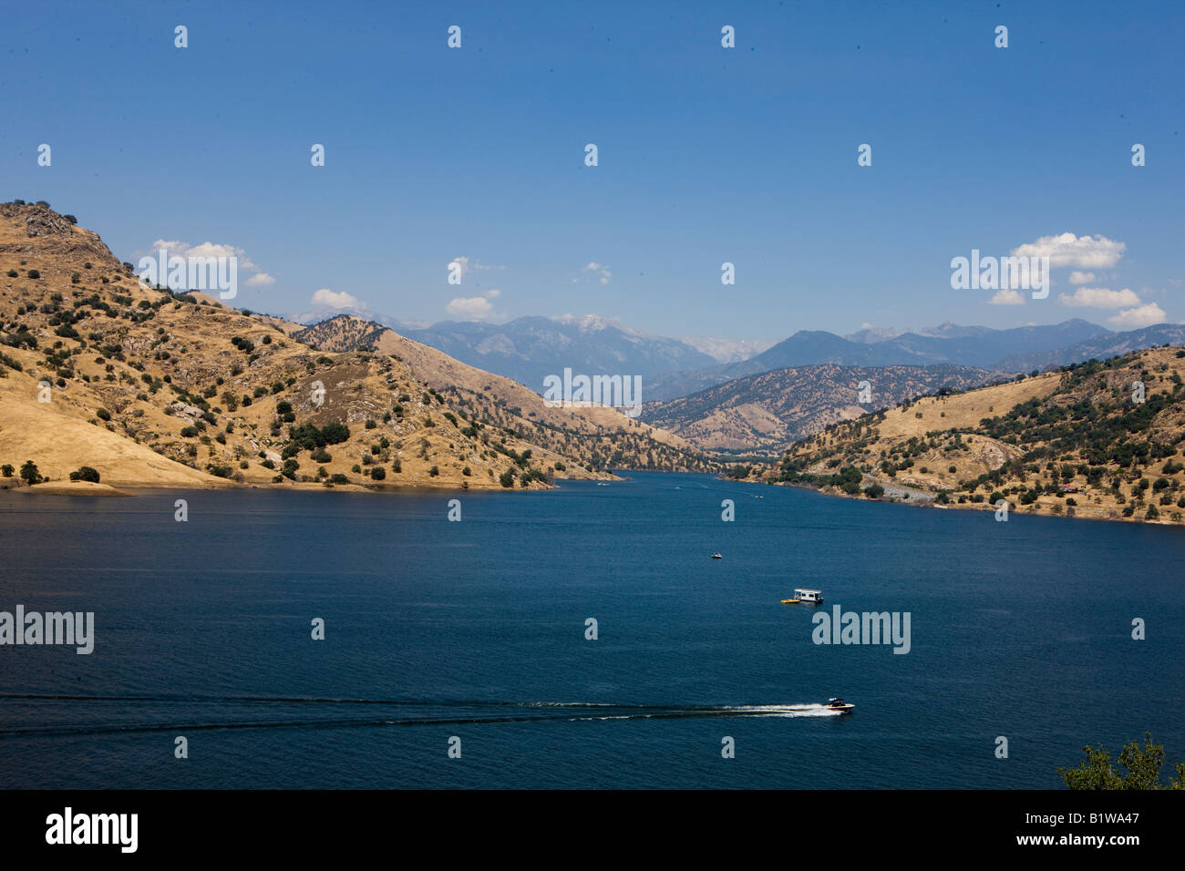 Boats cross Kaweah Lake, south of Sequoia National Park, near Lemon