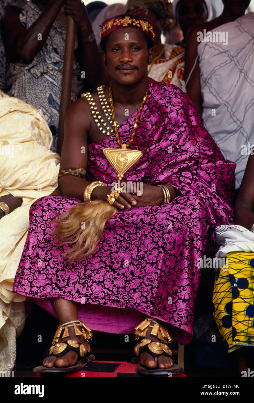 GHANA West Africa Kumasi Ashanti chief Yamfohene at Akwasidae Festival in purple mauve printed fabric textile Stock Photo