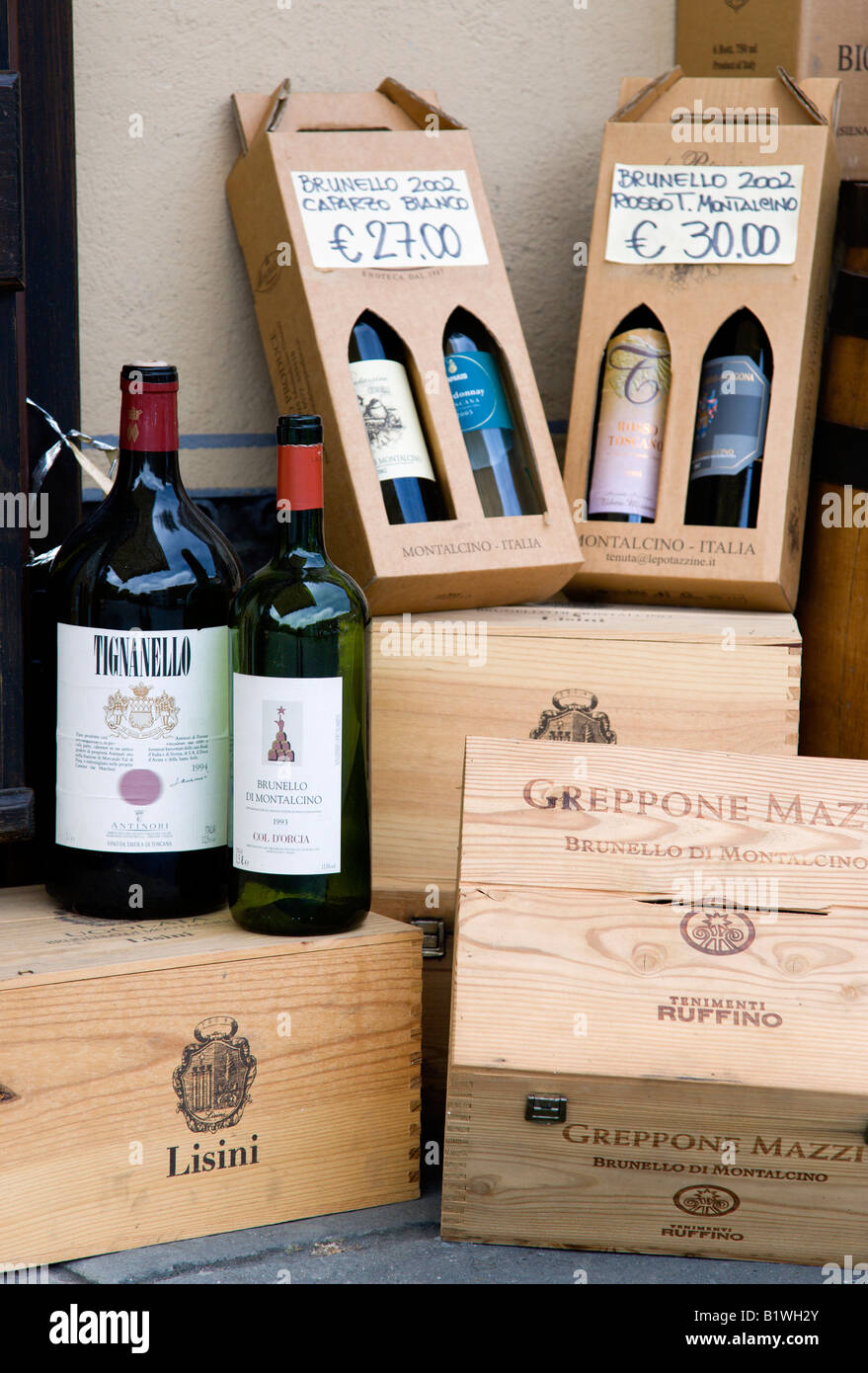 ITALY Tuscany Montalcino Red wine shop display in Medieval hill town of  different sized bottles and boxes with prices in Euros Stock Photo - Alamy