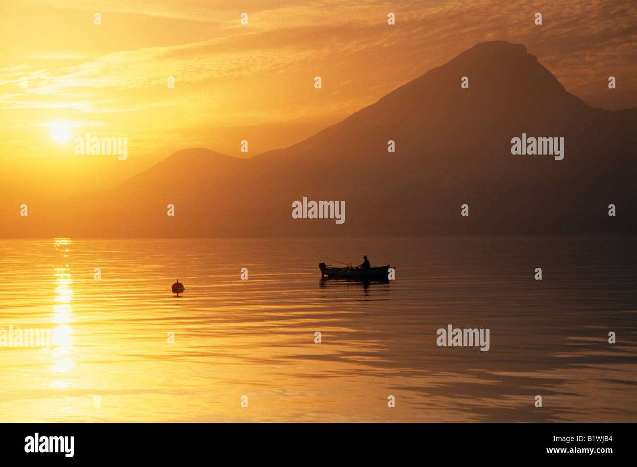 Fishing boat on lake garda hi-res stock photography and images - Alamy