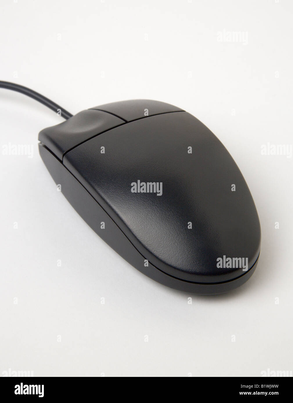 INDUSTRY Technology Computers Standard basic black cable attached mouse Stock Photo