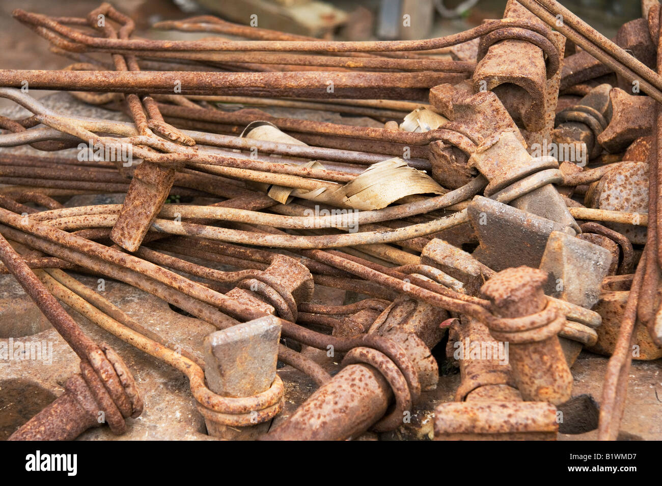 Rusting iron pins waiting to be recycled Stock Photo Alamy