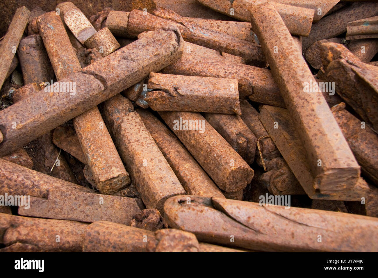 Rusting iron bars waiting to be recycled Stock Photo Alamy