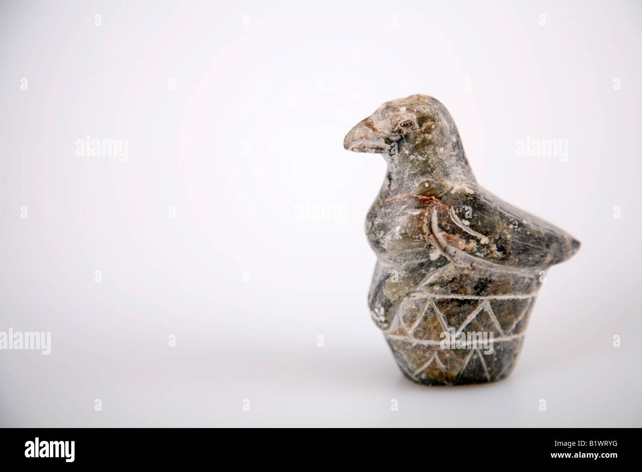 Soapstone carving of Zimbabwe bird on a white background Stock Photo