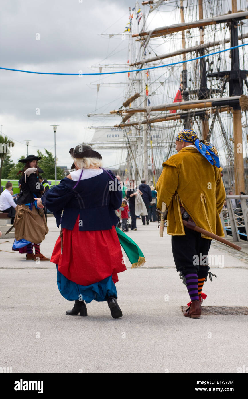 Two crew members from sailing ship dressed in period costume Belfast