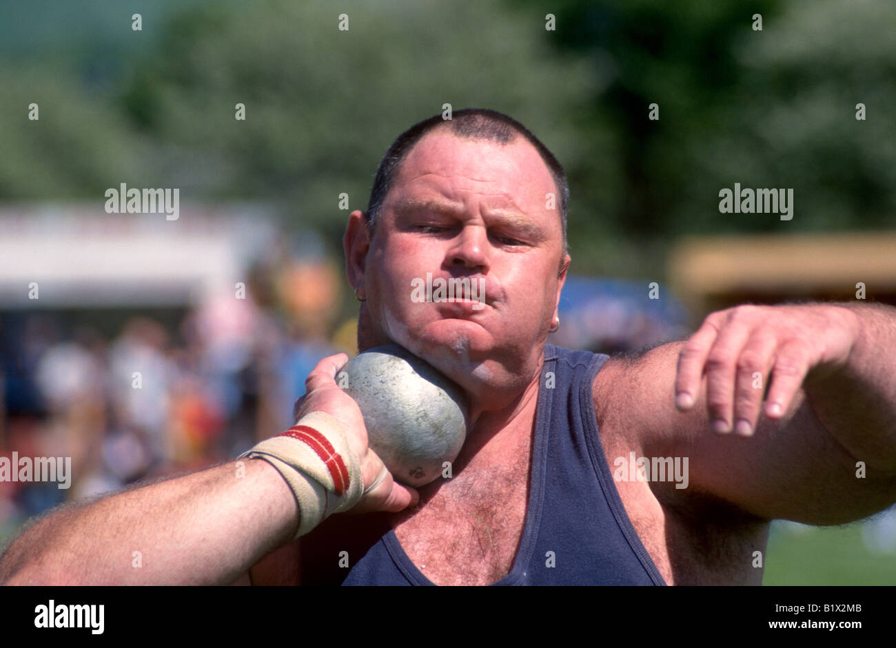 Shot put contestant at a traditional Scottish Highland games event Stock Photo