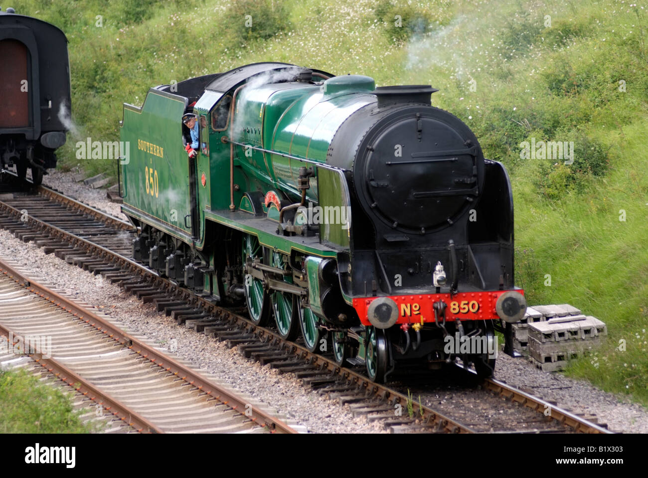 Steam engine 850 Lord Nelson train in Cotswolds countryside Gloucestershire England Stock Photo
