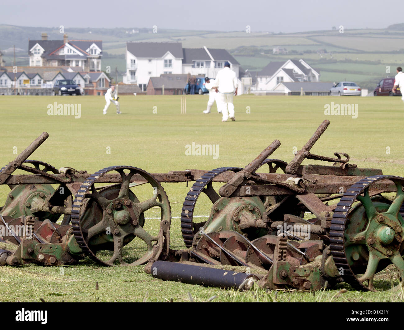 View of amateur cricket match from over grass cutting machine, Bude verses Tregony at Bude, 28.06.08 Stock Photo