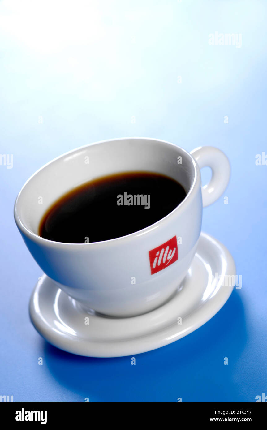 a cup of coffee on a blue background Stock Photo - Alamy